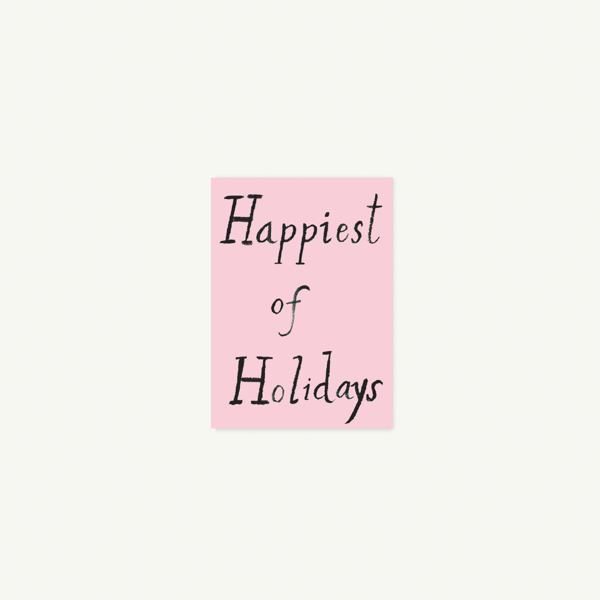 Happiest of Holidays petite card by Mr. Boddington’s Studio in pink with black script.