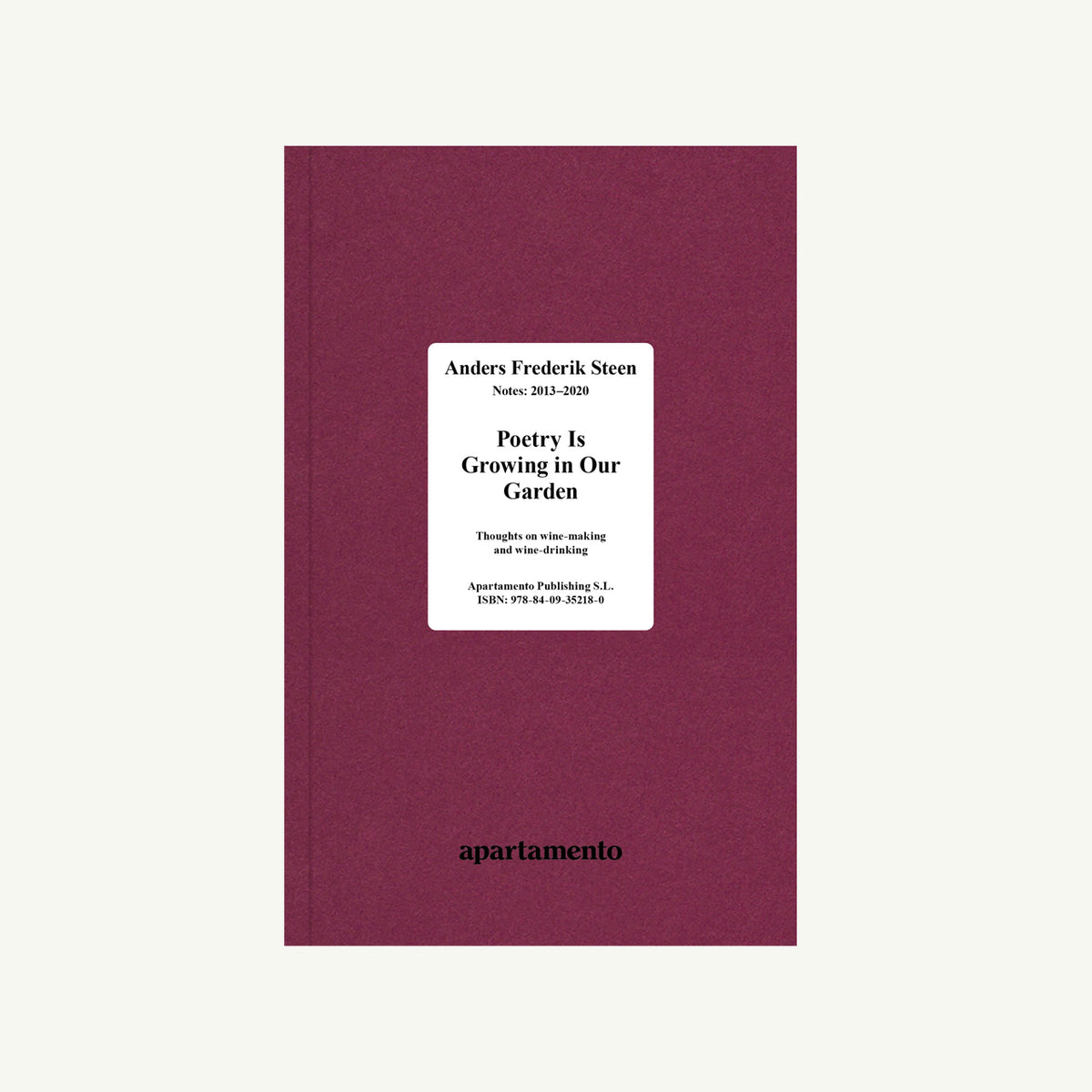 A maroon book, Poetry Is Growing in Our Garden Vol. I by Apartamento.