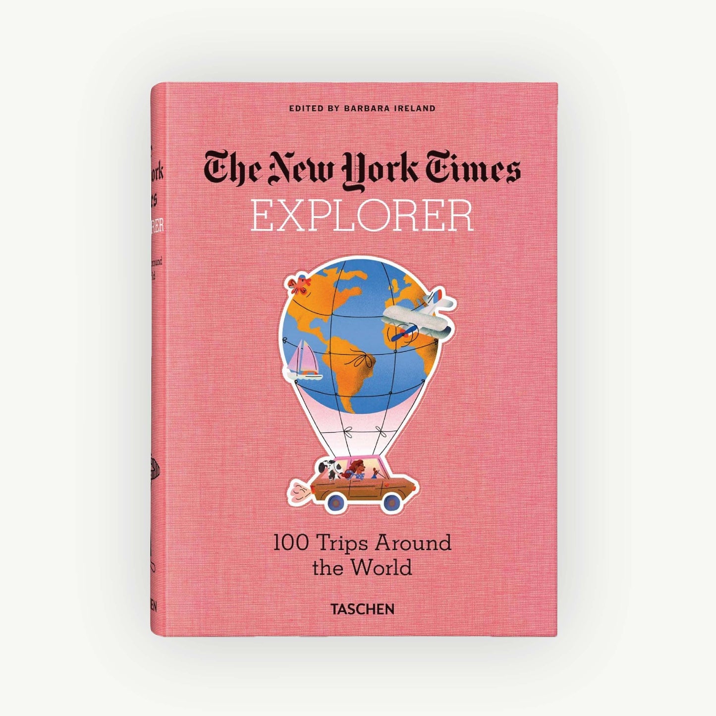 Pink cover with globe, car, and 100 dream trips—Aesthetic Movement NYT Explorer edition.
