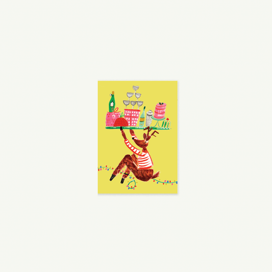Reindeer in scarf holds cakes, drinks, and Cocktail for Dasher card by Mr. Boddington’s Studio.