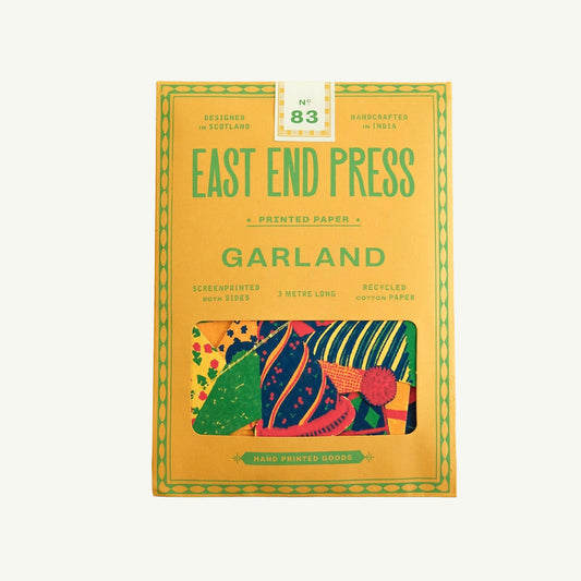 East End Press BIRTHDAY PARTY SEWN GARLAND, handmade decoration with green text on yellow.
