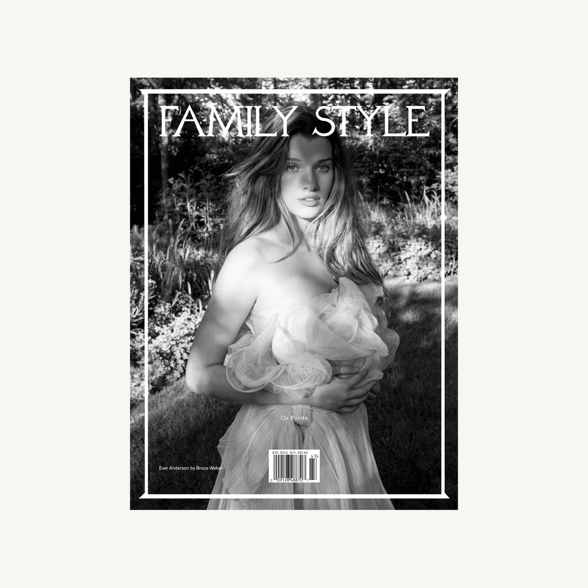 Woman in a flowing dress on the cover of Family Style Magazine by Family Style.