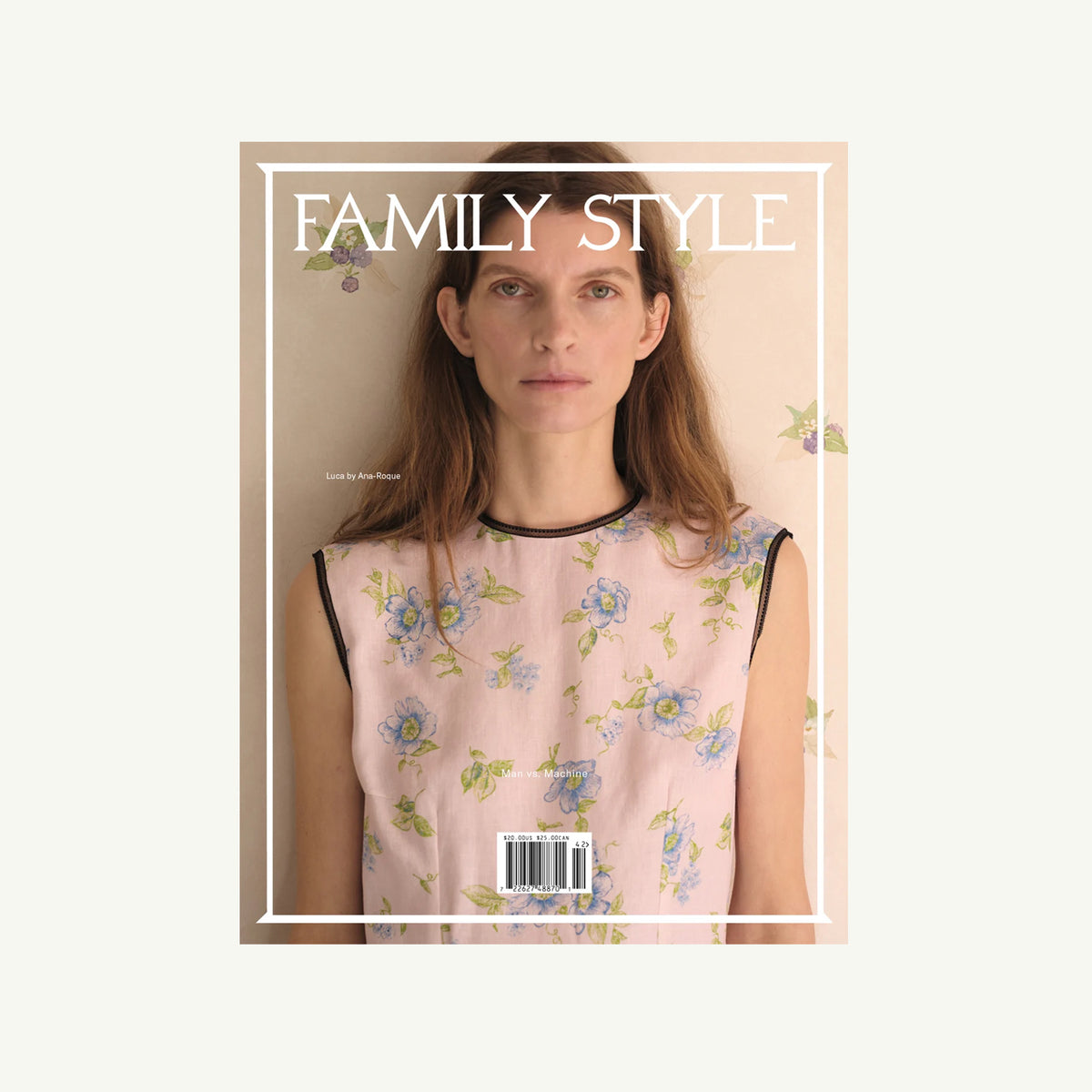 Woman in floral top on Family Style Magazine cover, neutral background.