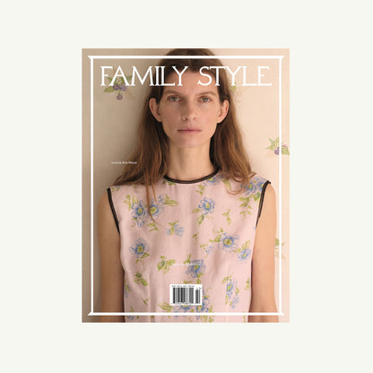 Woman in floral top on Family Style Magazine cover, neutral background.