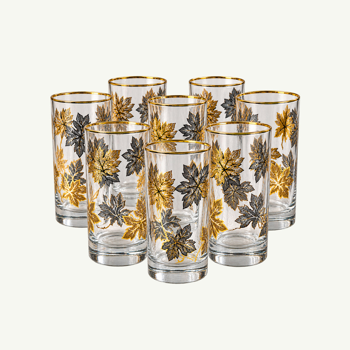 Set of 8 Vintage Gold Embossed Highball Glasses by Mr. Boddington’s Studio, neatly arranged.