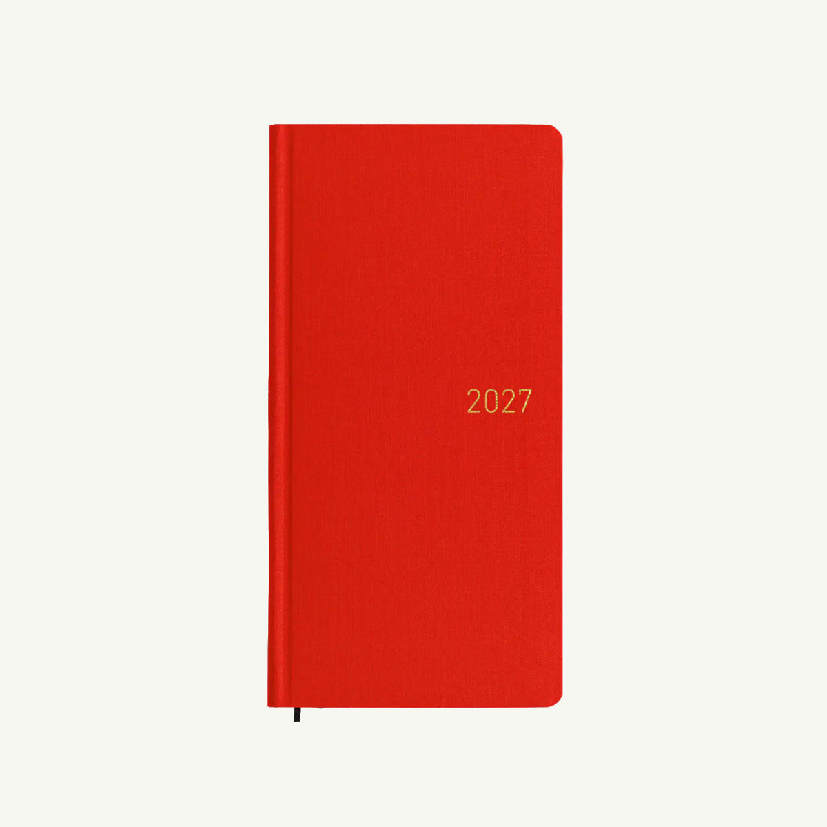 Red Hobonichi Techo 2027 Weeks planner, closed with gold 2027 text on the cover.