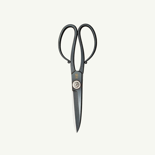IKNM Tanebasami Scissors: handmade black metal shears with oval loops and a central pivot screw.