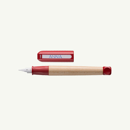 Lamy ABC lefty fountain pen, red cap, maple barrel, ergonomic, labeled ANNA.