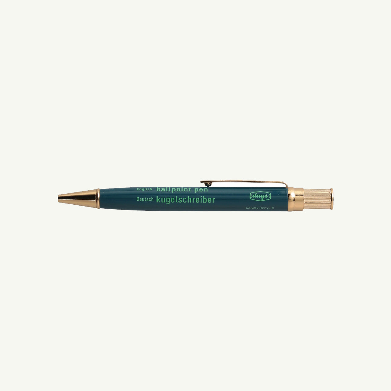 A gold-plated brass ballpoint pen with clip from MARK'S Inc.; retractable and refillable.
