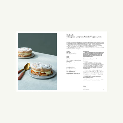 A pastry topped with whipped cream from the More Than Sweet cookbook.