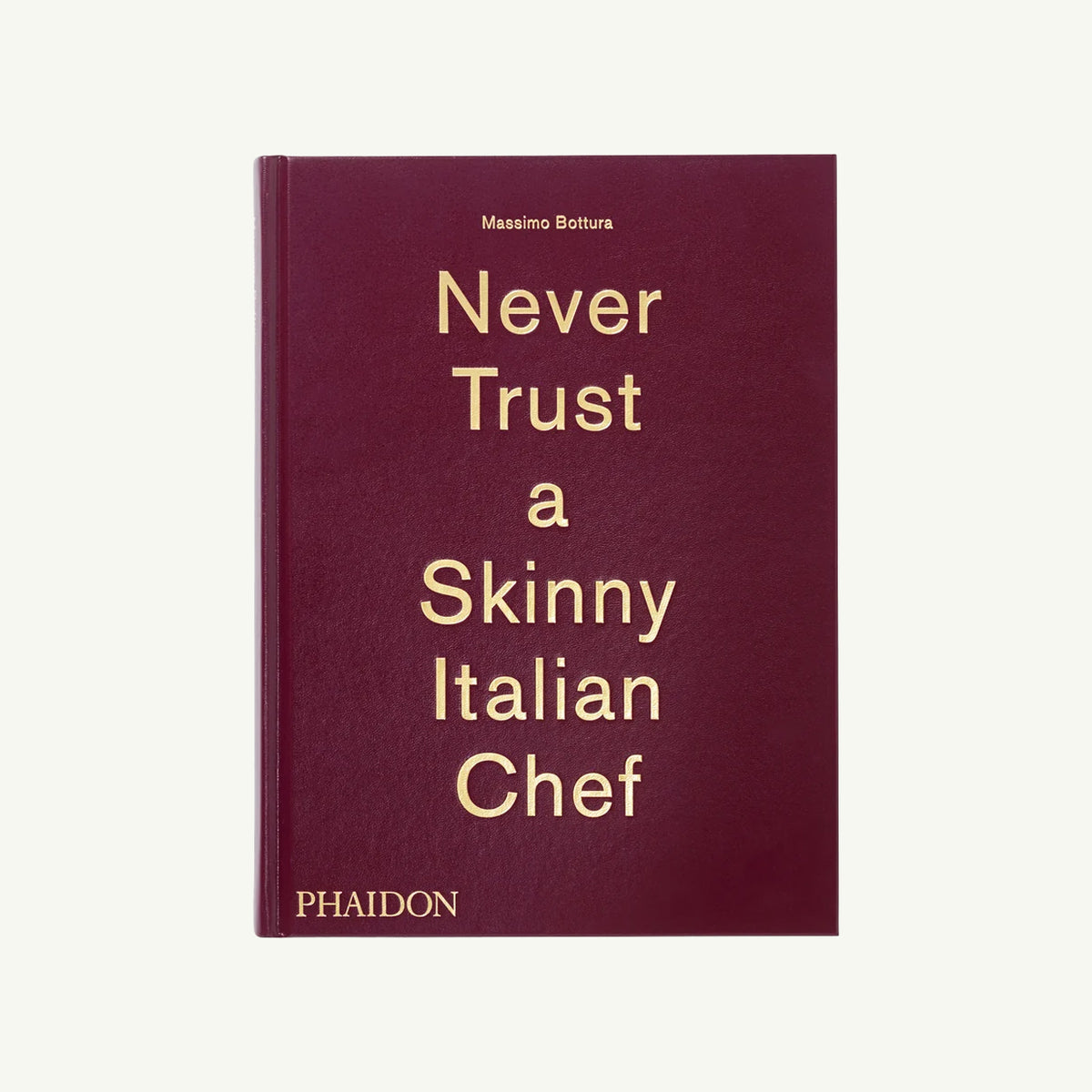 A maroon Phaidon cookbook titled Never Trust a Skinny Italian.