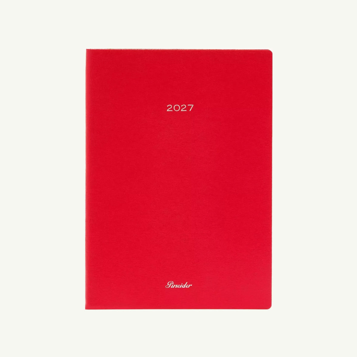 Red Pineider’s Milano 2027 Diary with the year in the center and a logo at the bottom.