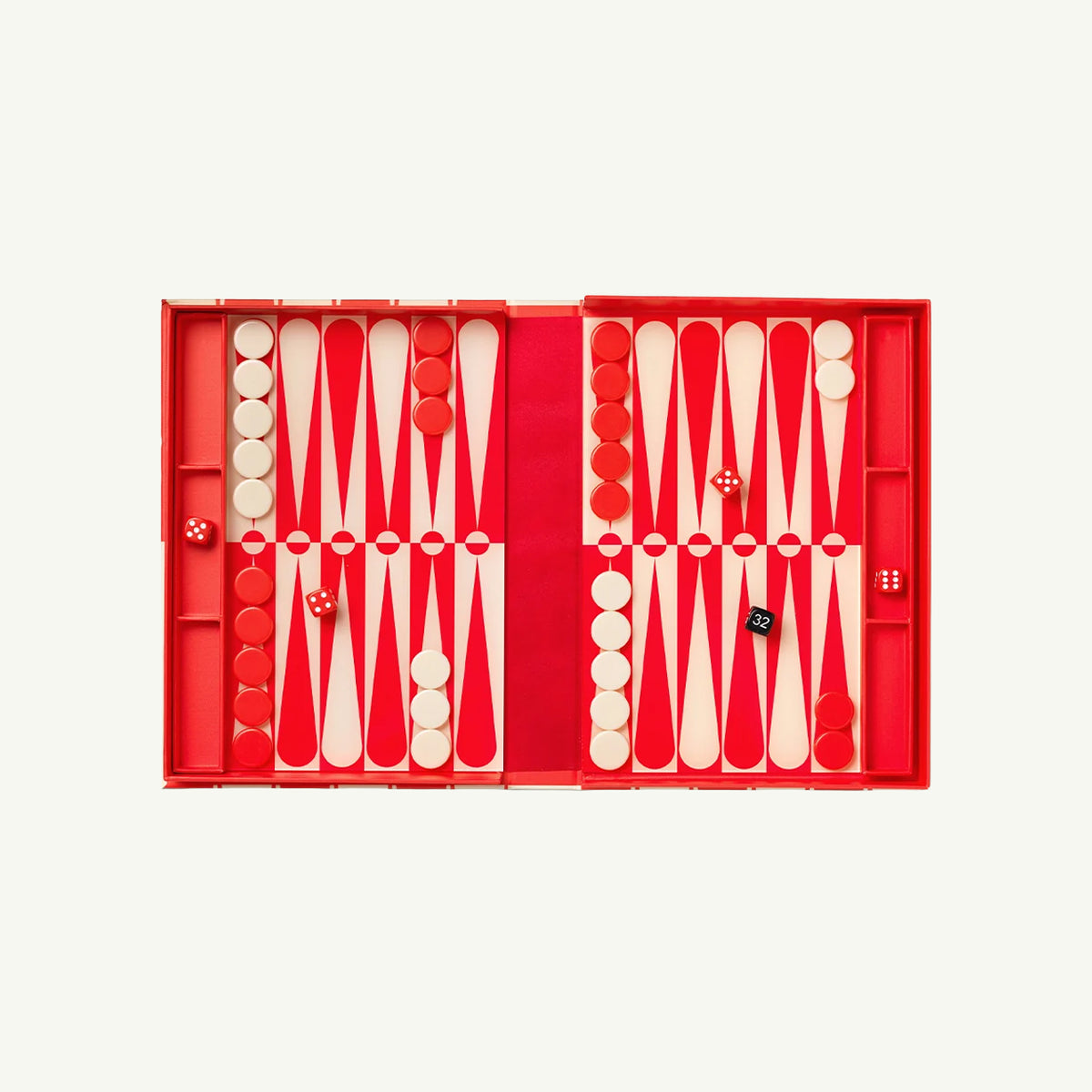 Open Printworks Backgammon set with red and white pieces and dice on the game board.