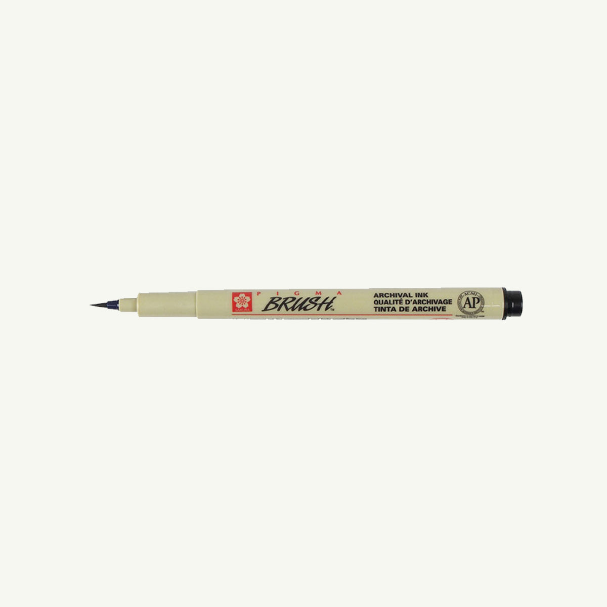Sakura Pigma Sketch Pen in beige with black tip, labeled, on white background.