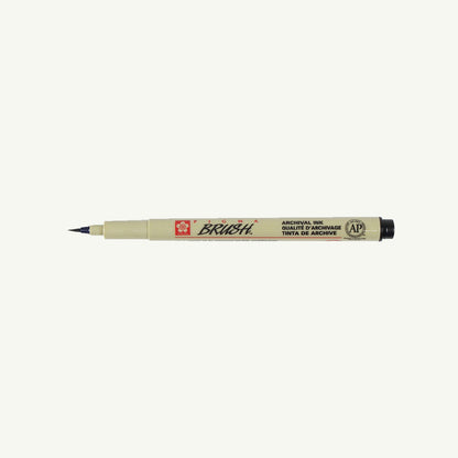 Sakura Pigma Sketch Pen in beige with black tip, labeled, on white background.