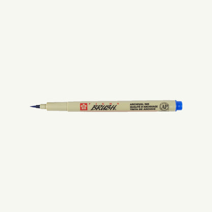 Sakura Pigma Sketch Pen in beige with blue cap on a plain white background.