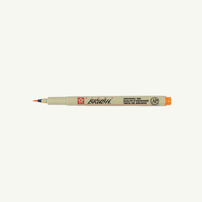 Sakura Pigma Sketch Pen with orange cap and BRUSH label on a white background.