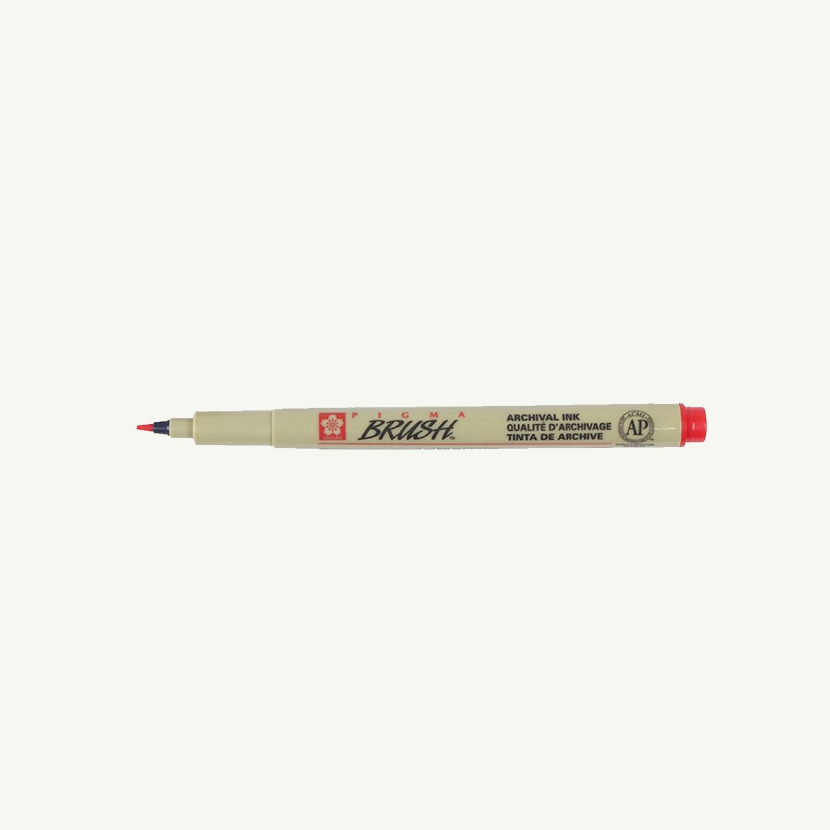 Sakura Pigma Sketch Pen in beige with red tip and cap, shown on a plain white background.