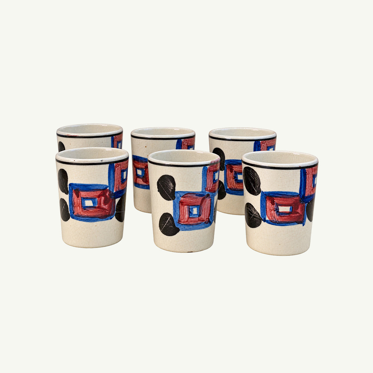 Set of 6 vintage ceramic tumblers by Mr. Boddington’s Studio with mid-century geometric patterns.