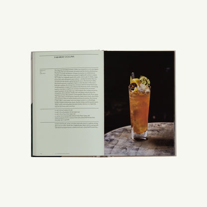 Open The Connaught Bar by Phaidon beside an elegant cocktail inspired by the famed bar.
