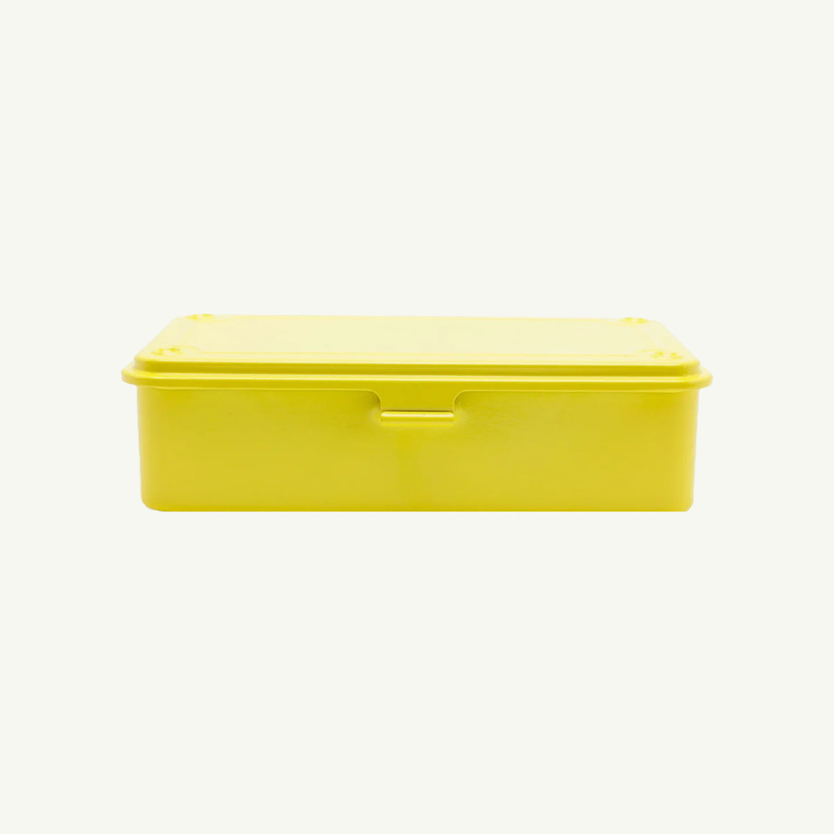 A closed Toyo Steel Monogrammed Storage Box in yellow sits on white, ideal for storage.