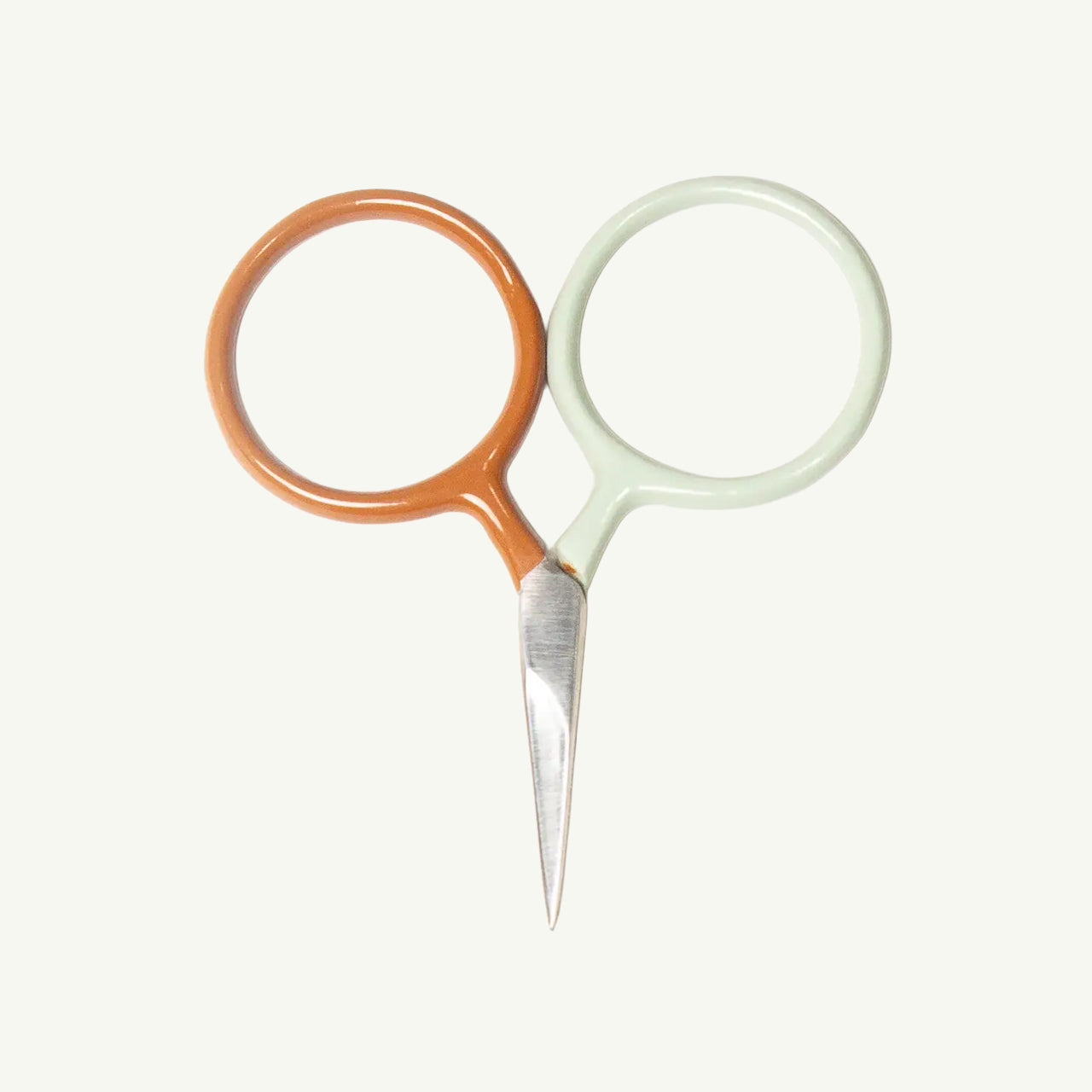 DEGEN Circle Mini Scissors with orange and light green handles on a plain white background.