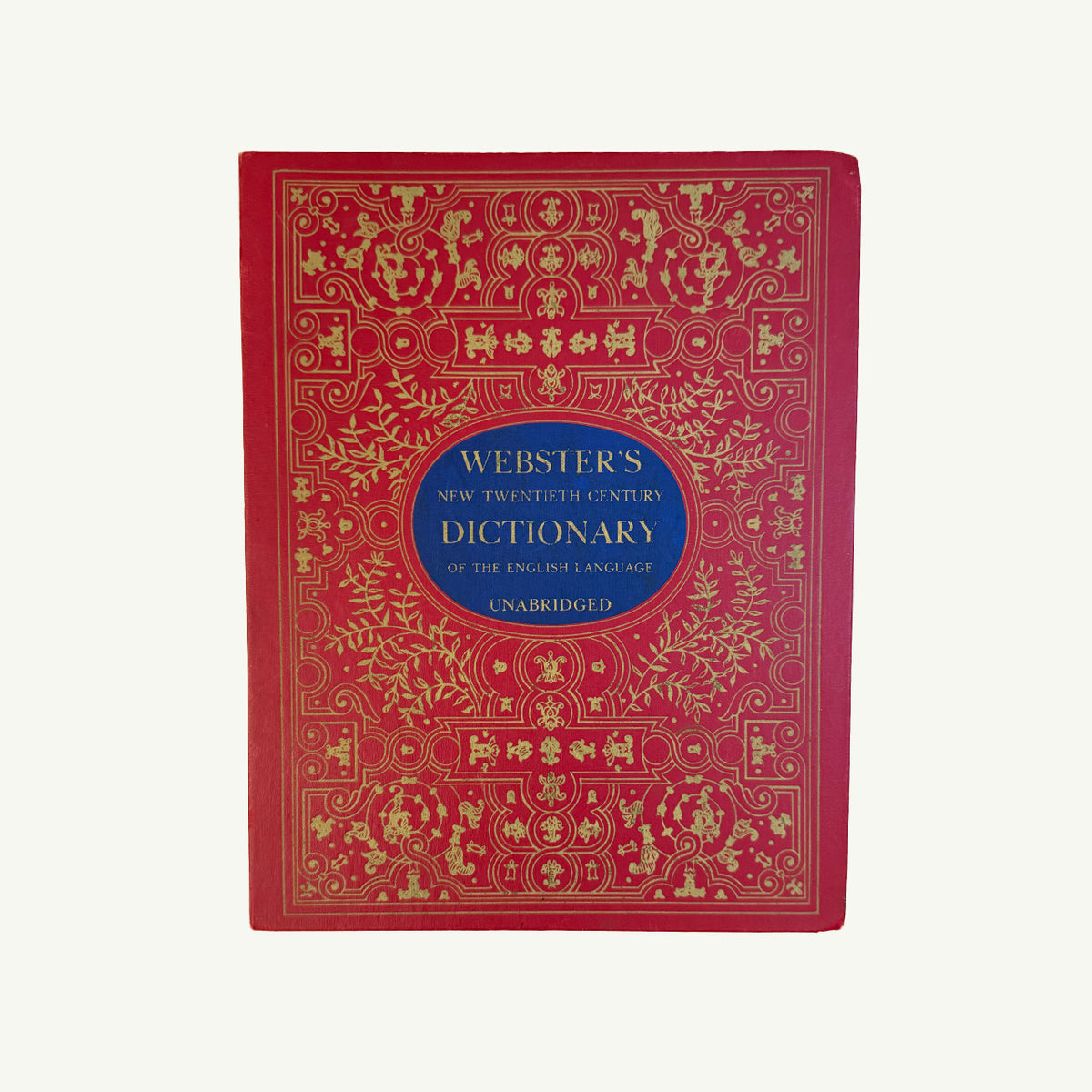 Mr. Boddington’s Studio Vintage 1964 Webster Dictionary in red cloth with gold and blue details.