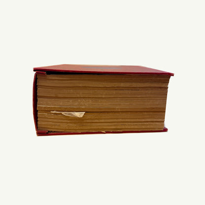 Vintage 1964 Webster Dictionary by Mr. Boddington’s Studio, red cover, aged/yellowed pages.