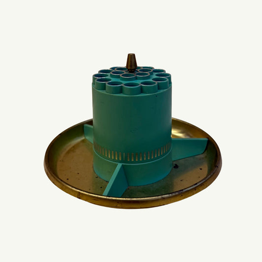 Teal, cylindrical Vintage MCM Pencil Organizer on a circular metal tray.