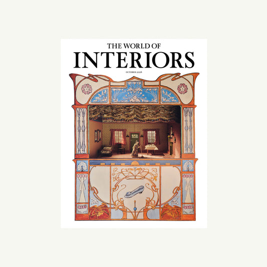 The World of Interiors magazine cover featuring a dollhouse scene and a glass slipper.