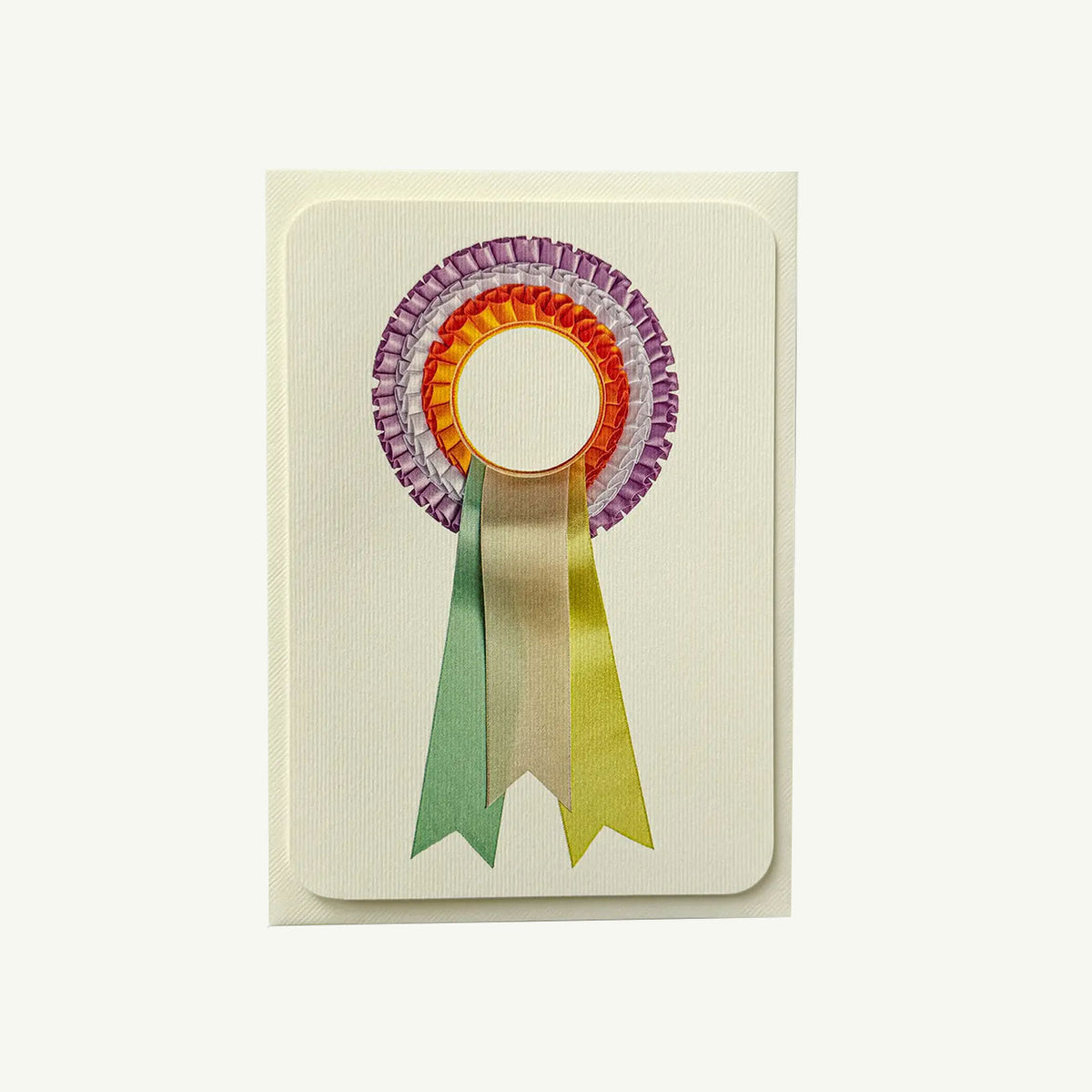 Canonbury Press Pastel & Orange Rosette Card with a purple, orange, green ribbon on plain backdrop.